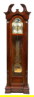 Sligh (American) Carved Mahogany Grandfather Clock, H 83.5" W 24" Depth 13.5": Sligh (American) Carved Mahogany Grandfather Clock, H 83.5" W 24" Depth 13.5" | Central urn finial, broken arched top, glass arched door opens to a brass face, and Moon phase dial. Seconds dial. Lower