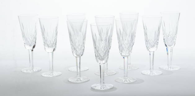 Waterford (Irish, B. 1783) 'Lismore' Fluted Champagne Glasses, H 7.25" Dia. 2.5" 10 pcs: Waterford (Irish, B. 1783) 'Lismore' Fluted Champagne Glasses, H 7.25" Dia. 2.5" 10 pcs | Each bearing signature branding to the undersides. Set of ten.