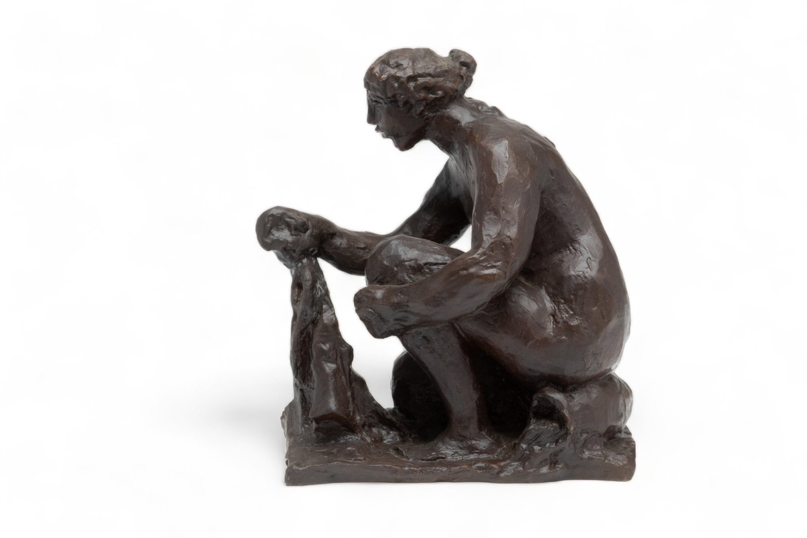After Pierre Auguste Renoir (French, 1841-1919) Bronze Nude "Laveuse", H 10" L 8.5": After Pierre Auguste Renoir (French, 1841-1919) Bronze Nude "Laveuse", H 10" L 8.5" | Signed on base. Early/mid 20th c. cast. Provenance: From the Estate of Prominent Collector, Leon Zielinski, Macomb