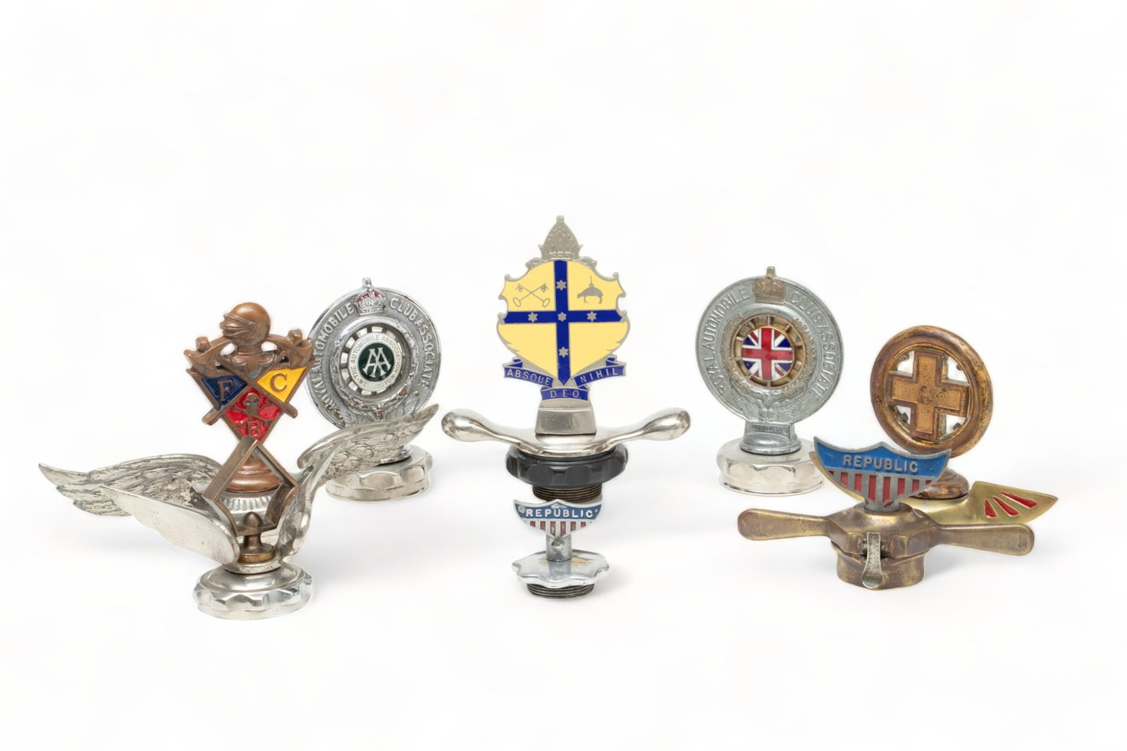 American, British, Australian And New Zealander Motor Mascots, Ca. Early to Mid 20th C., 8 pcs: American, British, Australian And New Zealander Motor Mascots, Ca. Early to Mid 20th C., 8 pcs | Lot includes one Automobile Association of Wellington, New Zealand, motor mascot. Having and enamel cen