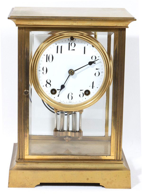 SETH THOMAS ORCHID #2 BRASS REGULATOR CLOCK,: SETH THOMAS ORCHID #2 BRASS REGULATOR CLOCK, H 9", L 7", D 5":A fifteen day clock with a half-hour strike having a brass case with beveled glass. Actual size 9 1/2" H. x 6 3/4" L x 5 1/2" D.