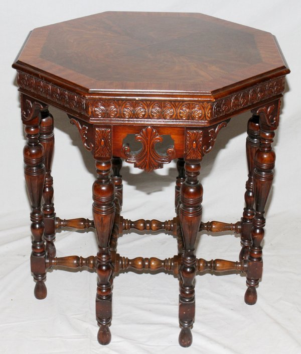 EDWARDIAN MAHOGANY PARLOR TABLE, C 1930, H 30": EDWARDIAN MAHOGANY PARLOR TABLE, C 1930, H 30", L 36", D 24":having an oval shaped top with contoured edge, fluted skirt, four pair of turned legs and pierced supported by a central wishbone shape and