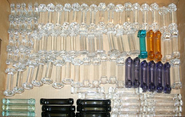 VAL ST. LAMBERT GLASS KNIFE RESTS, APPROX.: VAL ST. LAMBERT GLASS KNIFE RESTS, APPROX. 80 PCS., L 4"-5":Box lot of clear, amber, blue, green and violet colors;