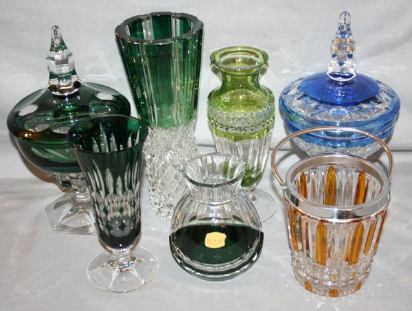 VAL ST. LAMBERT GLASS TABLEWARE GROUPING: VAL ST. LAMBERT GLASS TABLEWARE GROUPING:Four green vases and one covered compote; 1 blue covered compote; 1 amber bucket with silver plate rim and handle (no cover). H 5" - 9 3/4".