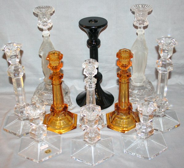 VAL ST. LAMBERT GLASS CANDLESTICKS: VAL ST. LAMBERT CLEAR TO COLORED GLASS CANDLESTICKS:1 short set of three, 1 tall pair clear glass, 1 single clear glass, 1 pair of amber, 1 single black, 1 pair figural. H 5" - 11 1/2".