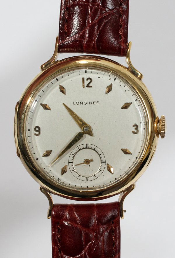 LONGINES 14KT YELLOW GOLD WRISTWATCH: LONGINES 14KT YELLOW GOLD WRISTWATCH:With leather strap.