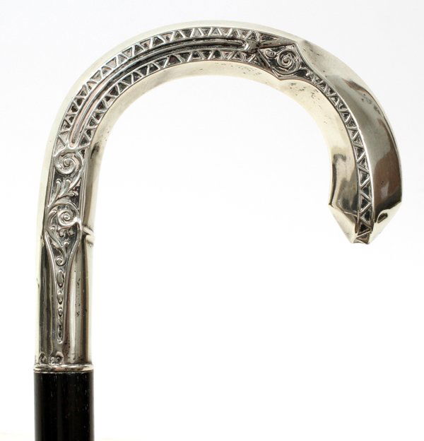 GERMAN SILVER DRESS CANE BY GOTTLIEB KURZ, C. 1: GERMAN SILVER DRESS CANE BY GOTTLIEB KURZ, C. 1900, L 37":An .800 silver handle with scroll and linear motifs, stamped at the collar with crown and crescent, "800", and mark for Gottlieb Kurz, Schwabi
