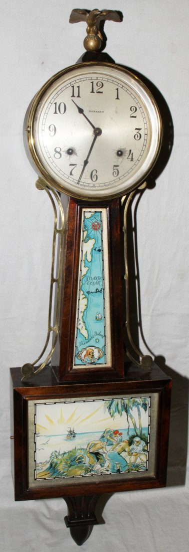 E. INGRAHAM CO. 'TREASURE ISLAND' BANJO CLOCK, : E. INGRAHAM CO. 'TREASURE ISLAND' BANJO CLOCK, H 38", W 10 1/2":With pendulum and key.