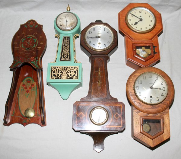 GILBERT, NEW HAVEN, SESSIONS & WATERBURY WALL C: GILBERT, NEW HAVEN, SESSIONS & WATERBURY WALL CLOCKS, C. 1925, FIVE, H 13"-24":Including 1 Gilbert painted clock with pendulum; 1 New Haven clock, painted green, with pendulum and key; 1 Sessions cloc