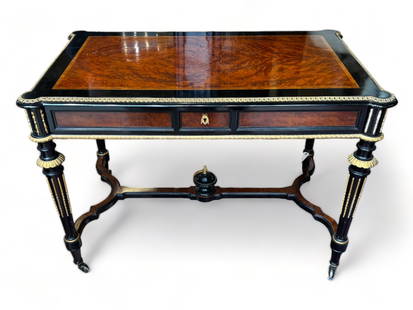 Attributed to Leon Marcotte (French/American, 1824-1887) Amboyna And Ebonized Library Table, Ca. 186: Attributed to Leon Marcotte (French/American, 1824-1887) Amboyna And Ebonized Library Table, Ca. 1865, H 29.25" W 43.25" Depth 26.5" | on tapered fluted legs with lower stylized x-form support.