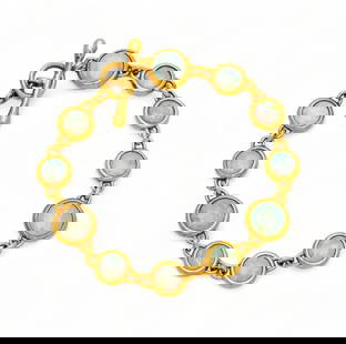 Tiffany & Co. Opal And 18K Yellow Gold Bracelet L 7": Tiffany & Co. Opal And 18K Yellow Gold Bracelet L 7" | Eleven round opals in 14K yellow gold conforming settings joined by a single chain link. the bracelet is joined by a yellow gold bar threaded