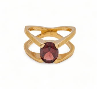 14k Gold And Garnet Modern Ring, Size 5 1/2 5.8g: 14k Gold And Garnet Modern Ring, Size 5 1/2 5.8g | Approx 1 1/2ct. Oval, prong set with split shank. Good fire to garnet. Provenance: From the Estate of Prominent Collector, Leon Zielinski, Macomb