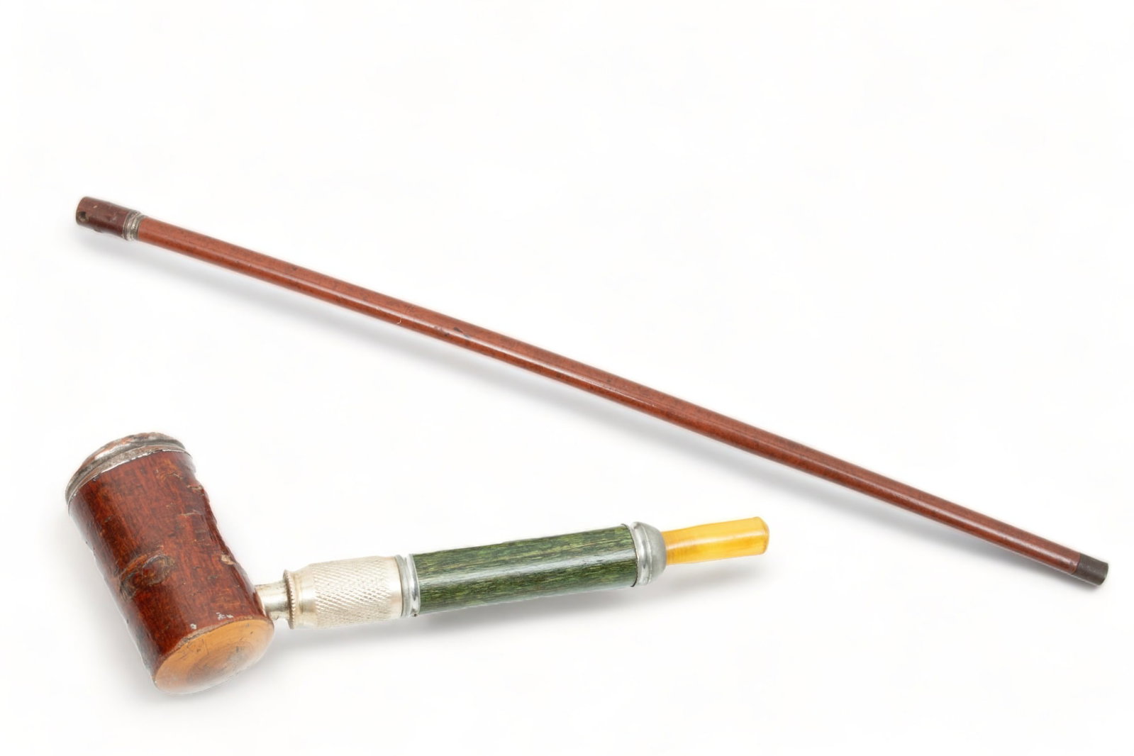 Carved Wood Smoker's System Walking Stick, L 34.5": Carved Wood Smoker's System Walking Stick, L 34.5" | Handle unscrews to reveal a compartment containing a metal and wood pipe shaft. the handle converts to the bowl for a tobacco pipe.