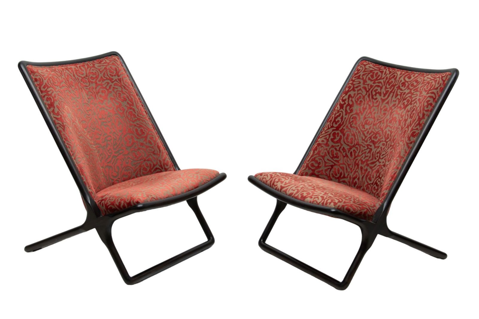 Pair of Ward Bennett for Brickel Upholstered Scissor Lounge Chairs, H 34" W 24" Depth 28" 2 pcs: Pair of Ward Bennett for Brickel Upholstered Scissor Lounge Chairs, H 34" W 24" Depth 28" 2 pcs | Having red patterned upholstery. Stained wood frames. Provenance: From the Collection of Bethany Belan