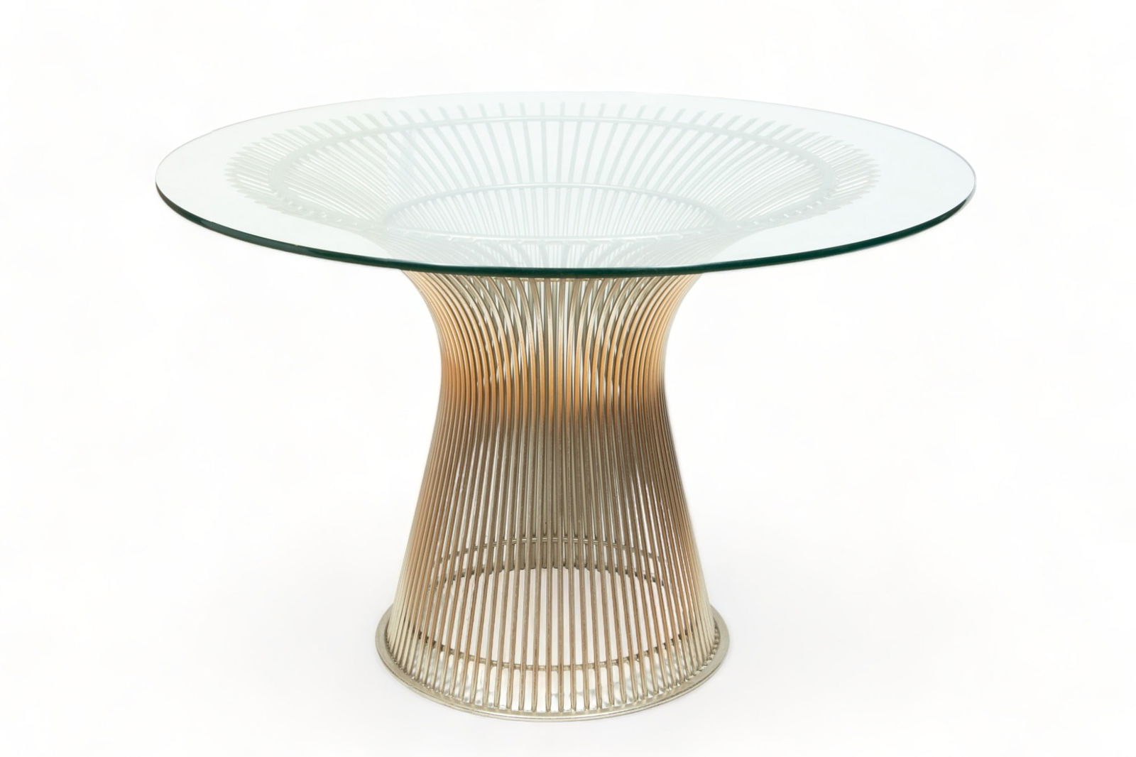 Warren Platner for Knoll International (American) Nickel Plated Steel & Glass 'Platner' Dining Table: Warren Platner for Knoll International (American) Nickel Plated Steel & Glass 'Platner' Dining Table, H 27.75" Dia. 42" | Designed in 1966 by Warren Platner (American, 1919-2006), the table offers the