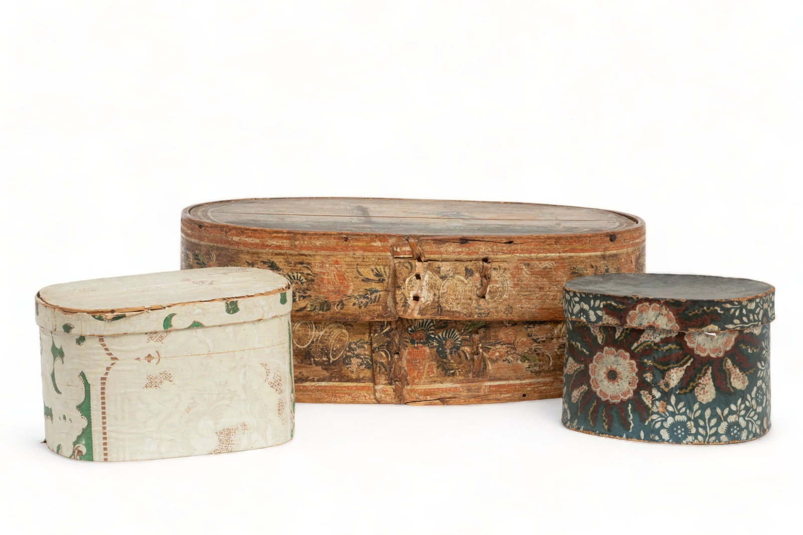 American Primitive Wooden Shaker Boxes, Ca. 1850, H 7" W 11.75" L 18.25" 3 pcs: American Primitive Wooden Shaker Boxes, Ca. 1850, H 7" W 11.75" L 18.25" 3 pcs | the collection offers hand-painted and printed motifs. the smallest box measures H 5" X W 6" X L 7.5". the mid-size box