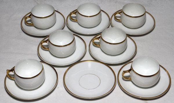 BAVARIAN PORCELAIN CUPS & SAUCERS, C 1900,: BAVARIAN PORCELAIN CUPS & SAUCERS, C 1900, SEVEN SETS:Gold borders. Fourteen pieces total. From the collection of Oliver T. Weidokal, Birmingham, Mi.