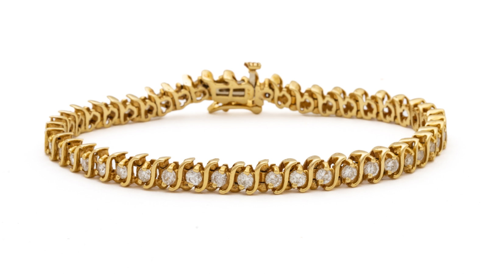 Diamond And 14Kt Yellow Gold Tennis Bracelet, L 7", 13 Grams: Diamond And 14Kt Yellow Gold Tennis Bracelet, L 7", 13 Grams | Forty-Six Round Cut Diamonds. Weighs Approximately 13 Grams. Diamond Total Weight 3 Cts.