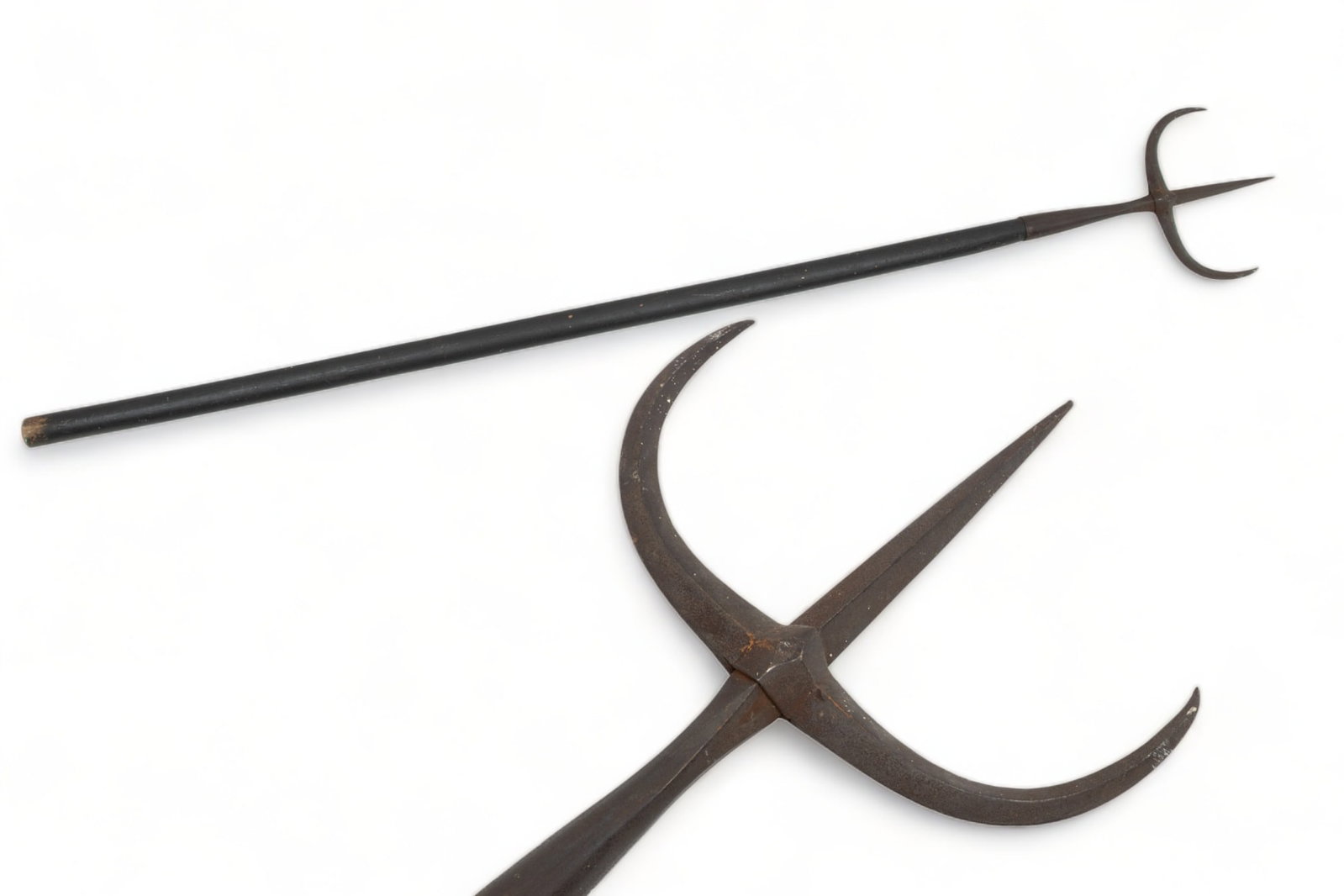 Chinese Iron And Wood Tiger Fork, Ca. 19th C., L 63.75": Chinese Iron And Wood Tiger Fork, Ca. 19th C., L 63.75" | Iron three-pronged spearhead, L 14.5", W 9.25". No apparent markings. Mounted to a wooden shaft. Provenance: Property from a private collectio