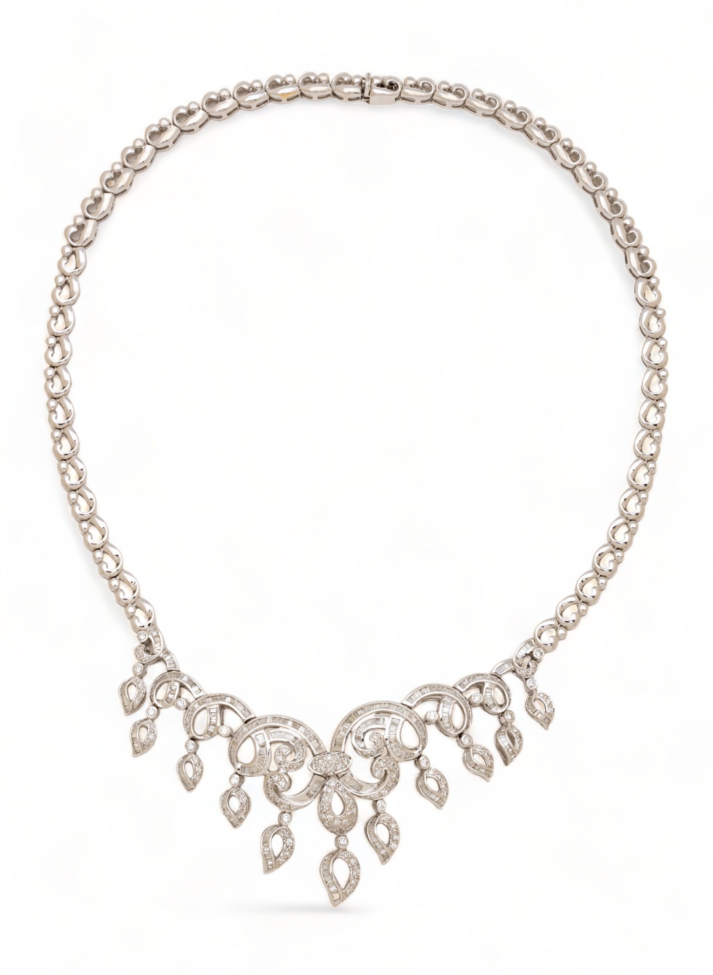 18KW Chandelier Necklace with Baguette And Rounds Dia. 15": 18KW Chandelier Necklace with Baguette And Rounds Dia. 15" | Containing 326 straight and tapered baguette cut diamonds weighing approximately 5.70 carats total, and 100 round brilliant cut diamonds we