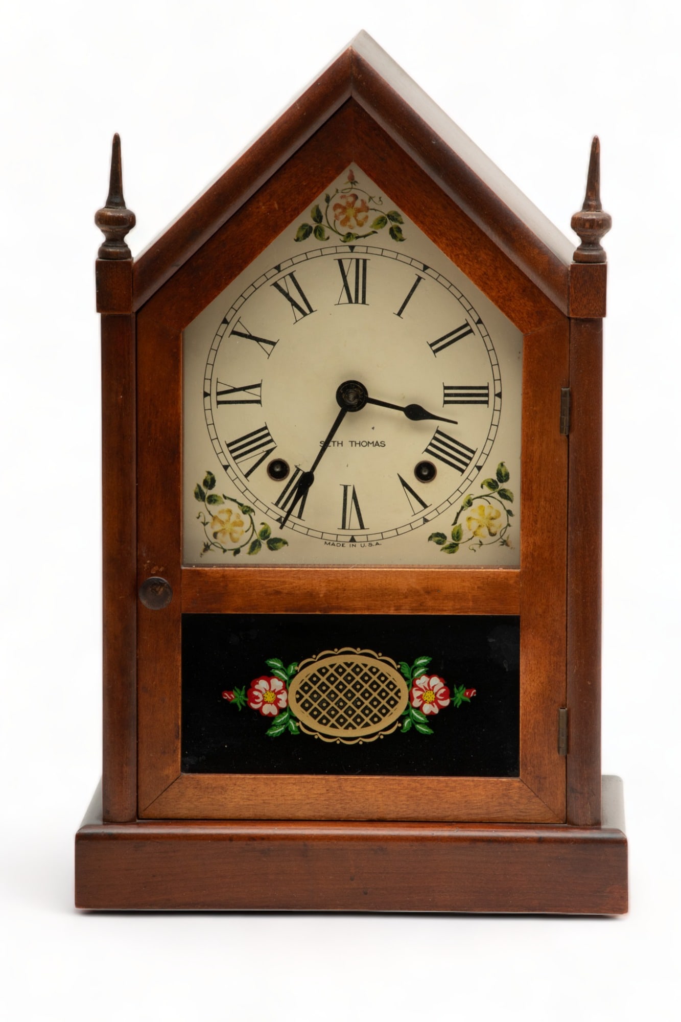 Seth Thomas (American) Mahogany Cathedral Style Mantel Clock, C. 1920, H 14.5", W 9.25", D 4.5": Seth Thomas (American) Mahogany Cathedral Style Mantel Clock, C. 1920, H 14.5", W 9.25", D 4.5" | Roman Numerals, Two-Key Wind, with Pendulum, Glass Panel Door Painted at the Inside with a Floral Desi