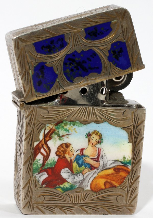 LADIES STERLING SILVER LIGHTER, BLUE INLAY,: LADIES STERLING SILVER LIGHTER, BLUE INLAY, ENGRAVED, FLORAL LEAF DESIGN, ITALY 2"H.:engraved Sterling case, with a cobalt blue enamel inlay on cap; depicts enamel love scene on case, #800, Italy mark