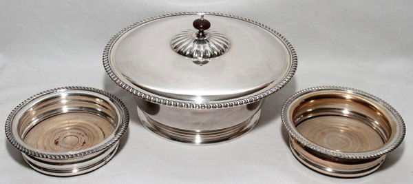 SHEFFIELD PLATE WINE COASTERS & CASSEROLE: SHEFFIELD PLATE WINE COASTERS, PAIR, & COVERED CASSEROLE, DIA 10":All with gadroon edges. The wine coasters have wood bases. Three items total.