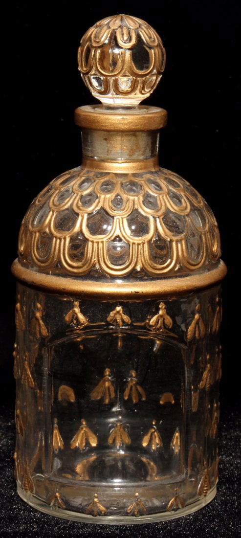 GUERLAIN GLASS PERFUME BOTTLE, H 6 1/2": GUERLAIN GLASS PERFUME BOTTLE, H 6 1/2":With painted gold accents.