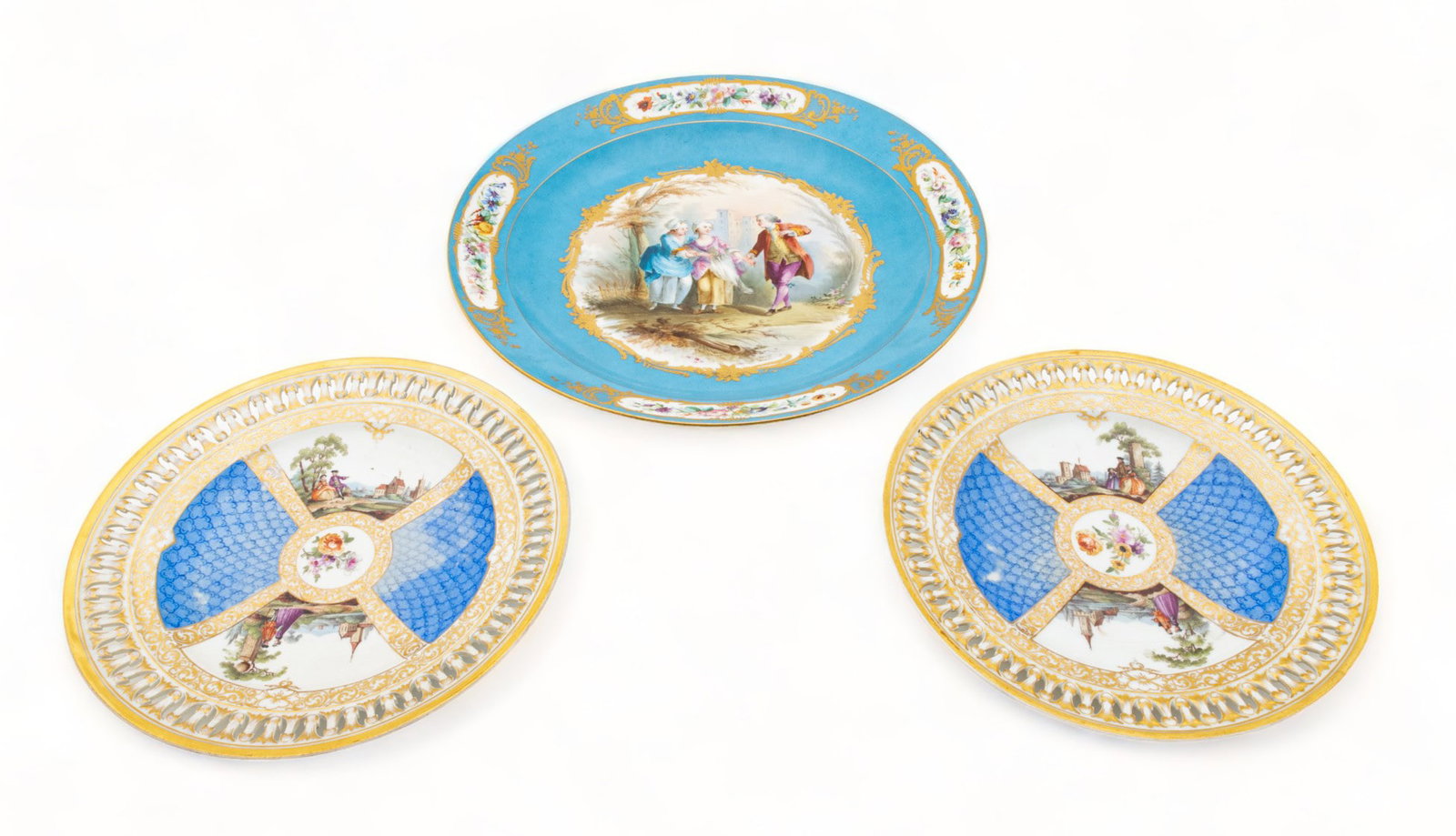 Sevres And Meissen Painted Porcelain Plates 19th C., H 1.75" Dia. 12" 3 pcs: Sevres And Meissen Painted Porcelain Plates 19th C., H 1.75" Dia. 12" 3 pcs | the lot includes a Sevres plate (dia. 12") with Bleu de Rein and fired gold rim, hand painted courting scene with floral c