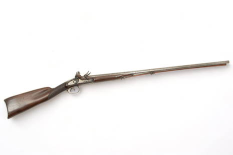 French Double Barrel Flintlock Shotgun, 20 Ga., Ca. 18th C., L 50.5": French Double Barrel Flintlock Shotgun, 20 Ga., Ca. 18th C., L 50.5" | 33.75" circular side by side barrels. Indiscernable proof marks at the edge of the left barrel (partially obscured by the stock).