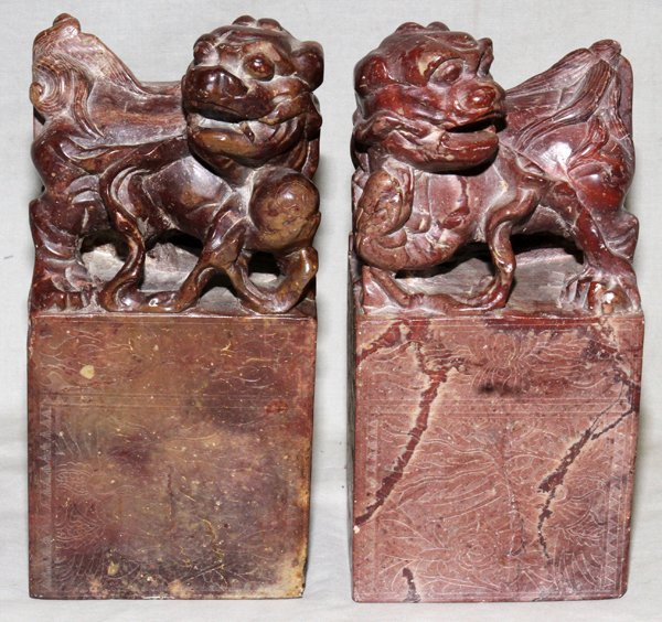 CHINESE SOAPSTONE CARVINGS OF FOO DOGS, PAIR,: CHINESE SOAPSTONE CARVINGS OF FOO DOGS, PAIR, H 7 1/2":Circa 1900. Probably meant to be seals that were never carved.