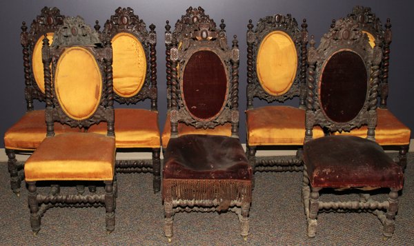 CHARLES II REVIVAL CARVED OAK SIDE CHAIRS, 8,: CHARLES II REVIVAL CARVED OAK SIDE CHAIRS, EIGHT, H 45":Each ornately carved frame with twisted sides and stretcher amidst leaf and bird motifs and an upholstered back and seat.
