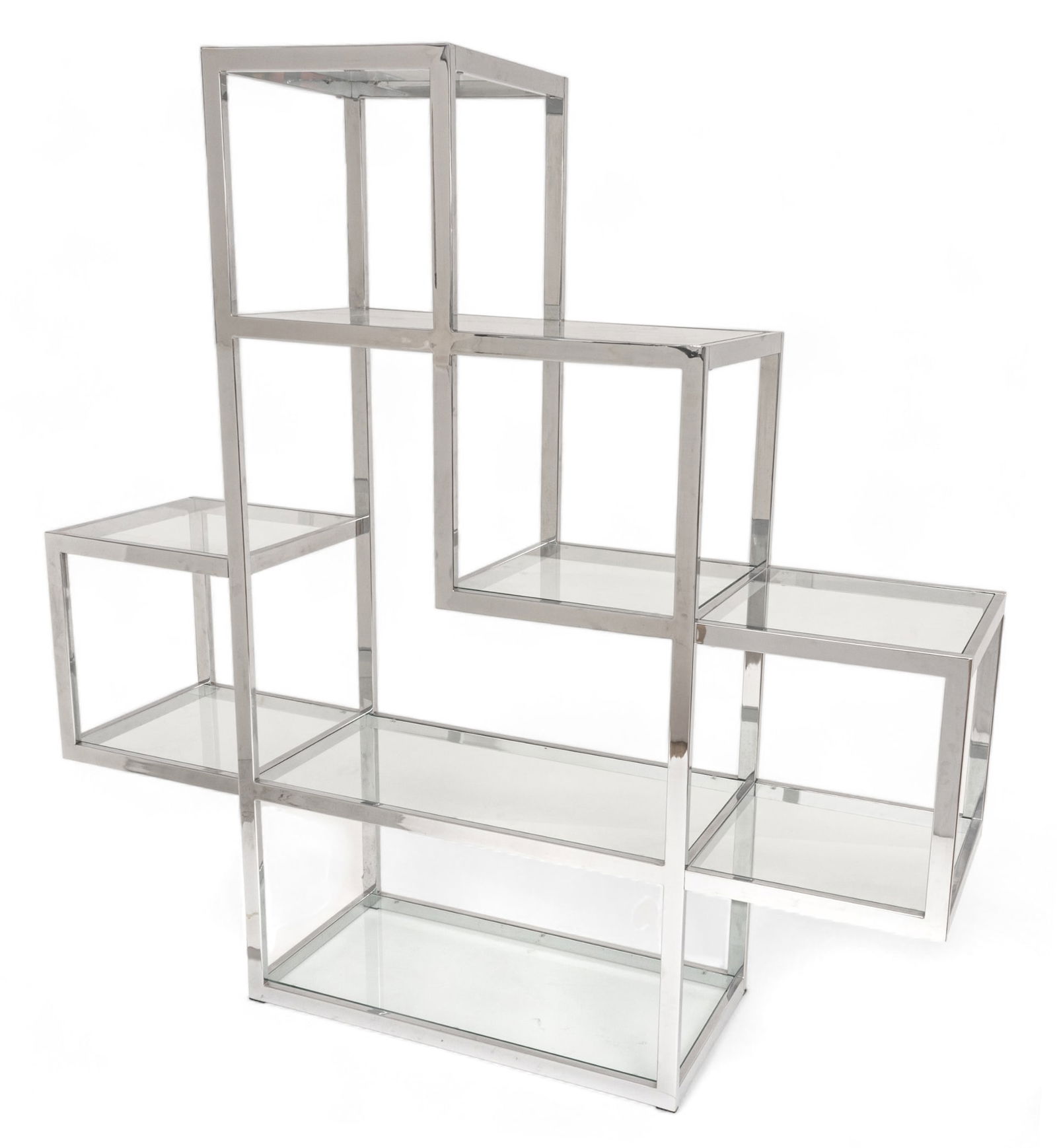 Milo Baughman (American, 1923-2003) Chrome And Glass Pyramid Etagere Bookshelf H 71.75" W 71.5": Milo Baughman (American, 1923-2003) Chrome And Glass Pyramid Etagere Bookshelf H 71.75" W 71.5" Depth 17.5" | Chromed metal frame with nine glass shelves (3 rectangular, 6 square). Label on the unders