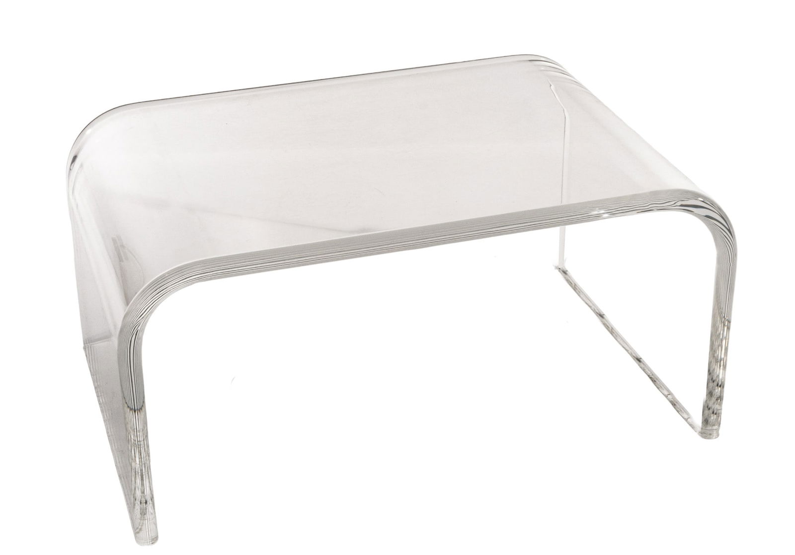 Style of Charles Hollis Jones (American, B. 1945) Lucite Waterfall Coffee Table, Ca. 1980, H 18" W: Style of Charles Hollis Jones (American, B. 1945) Lucite Waterfall Coffee Table, Ca. 1980, H 18" W 26" Depth 24" | the table offers overall rounded edges and bent form legs terminals. Unsigned. Circa
