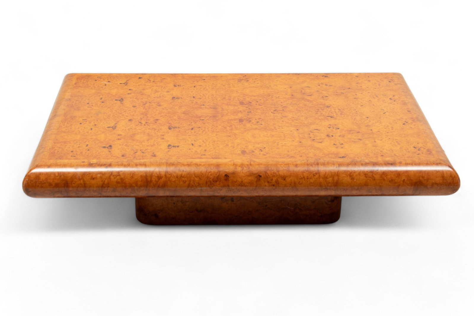 Contemporary Burled Wood Coffee Table, Ca. 1970, H 18" W 33" L 52": Contemporary Burled Wood Coffee Table, Ca. 1970, H 18" W 33" L 52" | the coffee table has a low presentation with rounded edges and square form base. Circa 1970. Provenance: Property of a Detroit, MI 