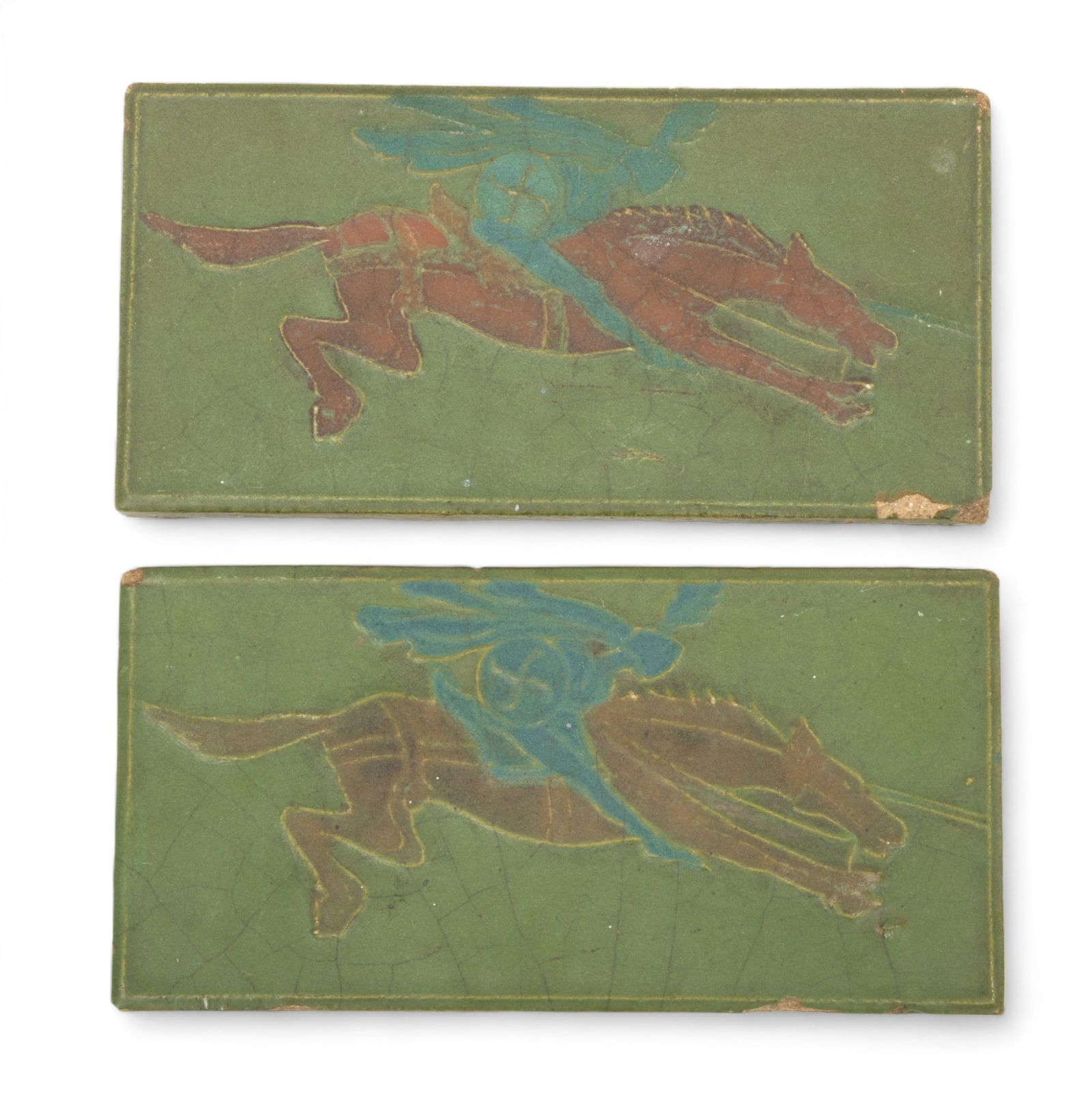 Rookwood Pottery (American) Faience Ceramic Tiles, Spirit of Cavalry, Ca. 1880, H 4.5" W 9.25" 2 pcs: Rookwood Pottery (American) Faience Ceramic Tiles, Spirit of Cavalry, Ca. 1880, H 4.5" W 9.25" 2 pcs | the tiles offer a moss green ground showing a charging brown horse and mounted figure with shield