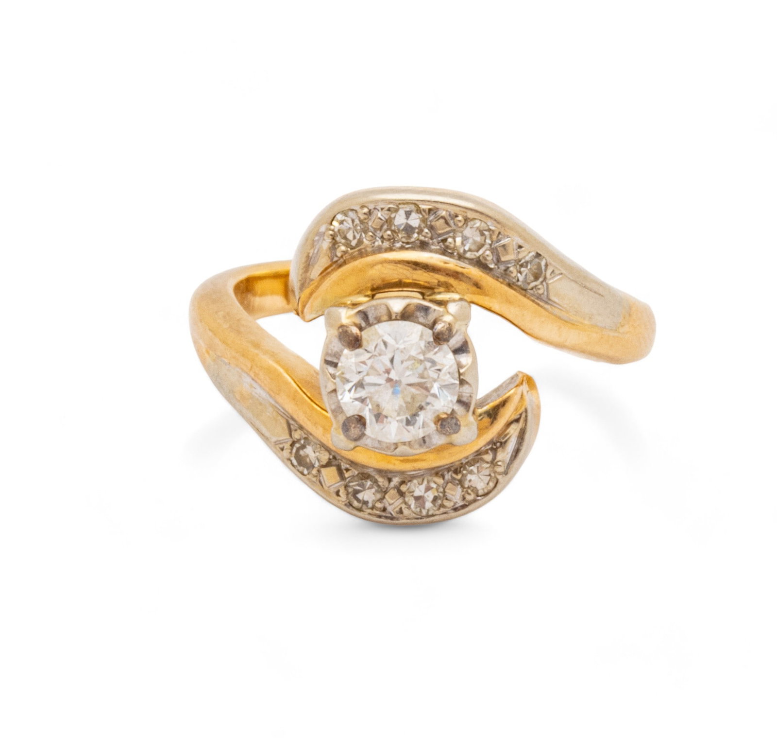 Diamond And 14K Yellow Gold Ring, Ca. 1960, Size: 3 5g: Diamond And 14K Yellow Gold Ring, Ca. 1960, Size: 3 5g | Offset shank ring. Approx. 1/4 ct (.25pts) round cut diamond + 8 enhancement diamonds. White and yellow gold. Total weight: 5 grams. Ring size: