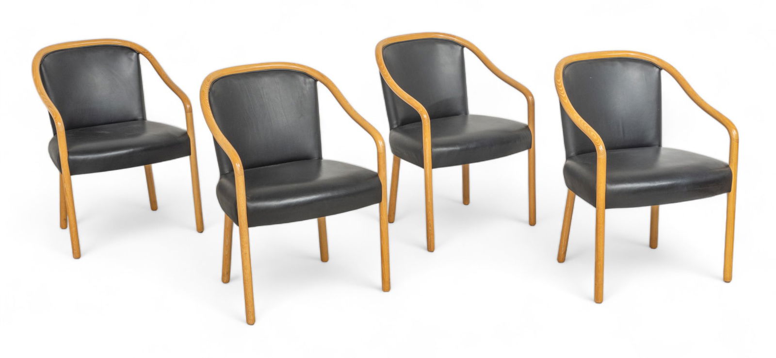 Ward Bennett Designs Set of Four Ash Wood And Black Leather Open Armchairs, H 32" W 23" Depth 22": Ward Bennett Designs Set of Four Ash Wood And Black Leather Open Armchairs, H 32" W 23" Depth 22" | Marked on underside Red Tag "Ward Bennett Designs for Brickel Associates"
