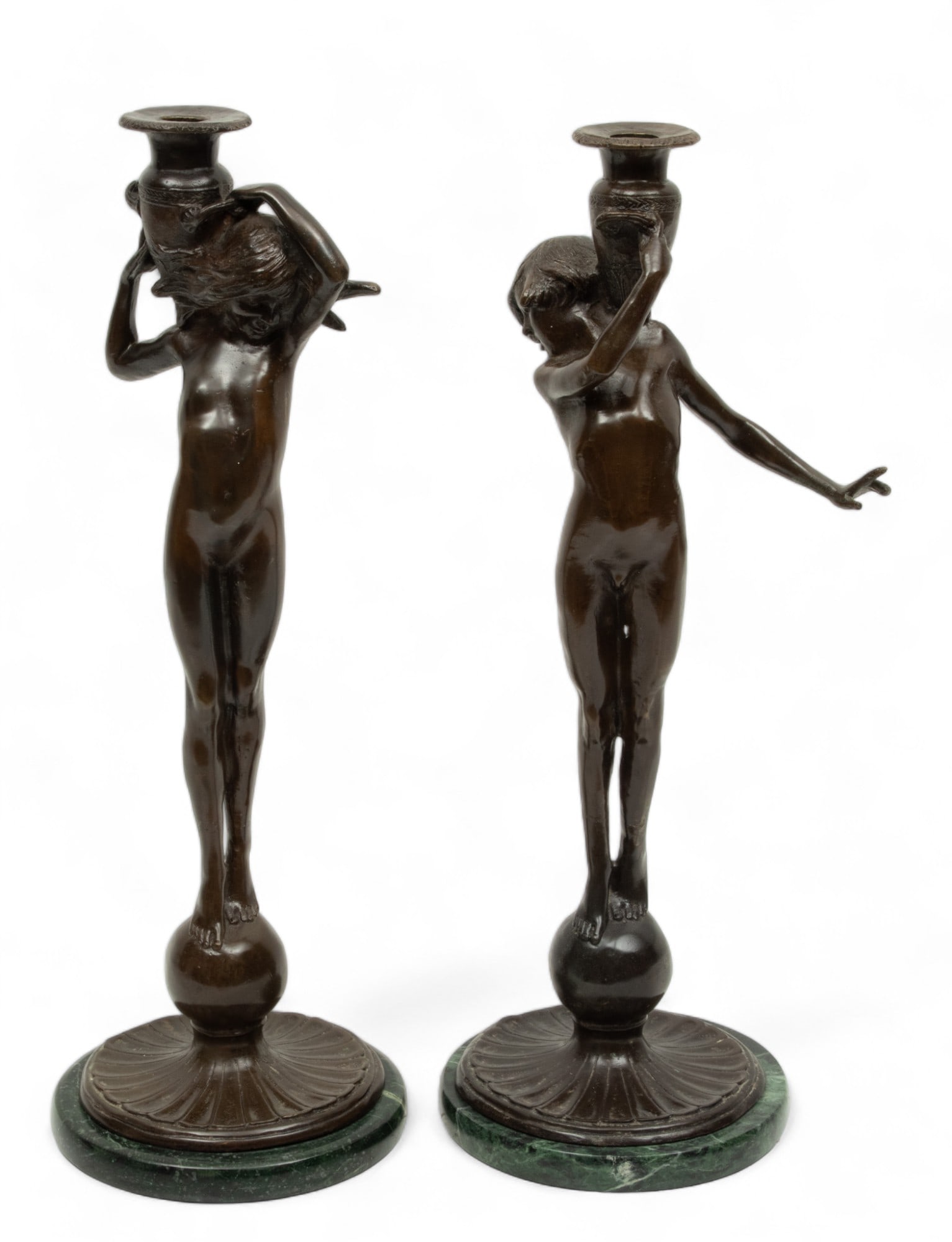 After Edward McCartan (American, 1879-1947) Bronze Candlesticks, Nude Figures with Amphora, H 16": After Edward McCartan (American, 1879-1947) Bronze Candlesticks, Nude Figures with Amphora, H 16" Dia. 5.75" 1 Pair | the candlesticks depict male and female spirits, each standing on a sphere and car