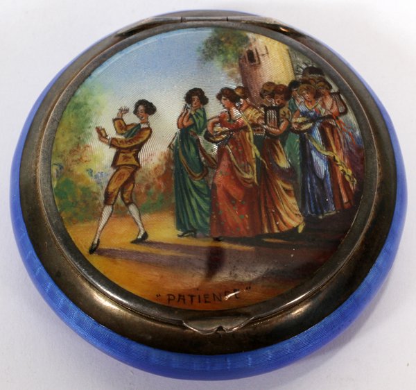 CONTINENTAL SILVER & ENAMEL ROUGE BOX,: CONTINENTAL SILVER & ENAMEL ROUGE BOX, DIA 1 3/4", WITH ENGLISH IMPORT MARKS:A round sterling silver box with hinged lid opening to mirrored and gilt interior, the cover is painted with a figural scen