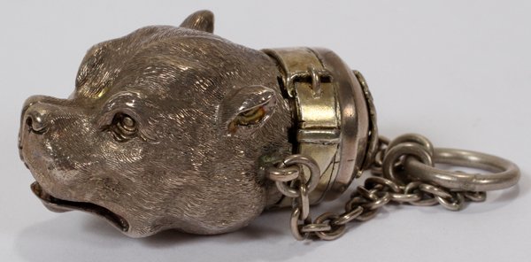 EUROPEAN SILVER DOG-FORM VINAIGRETTE, 19TH C.,: EUROPEAN SILVER DOG-FORM VINAIGRETTE, 19TH C., W 1 1/2":In the form of a dog with open mouth baring tongue, hinges at the neck and opens to the grille, engraved "Thornhill" at the interior, with a Vic
