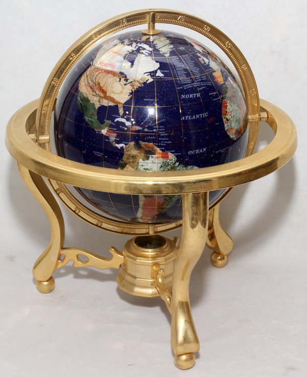 SEMI PRECIOUS STONE GLOBE OF THE WORLD ON STAND: SEMI PRECIOUS STONE GLOBE OF THE WORLD ON STAND, H 16", W 12":Inlaid with various stones from around the world including lapis lazuli and turquoise.