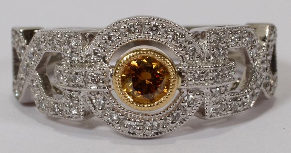 ART DECO .25CT Y/DIAMOND & PLATINUM RING: ART DECO INFLUENCED .25 CT YELLOW DIAMOND & PLATINUM RING, SIZE 5 3/4:No apparent markings. Totaling approximately 5.0 grams.