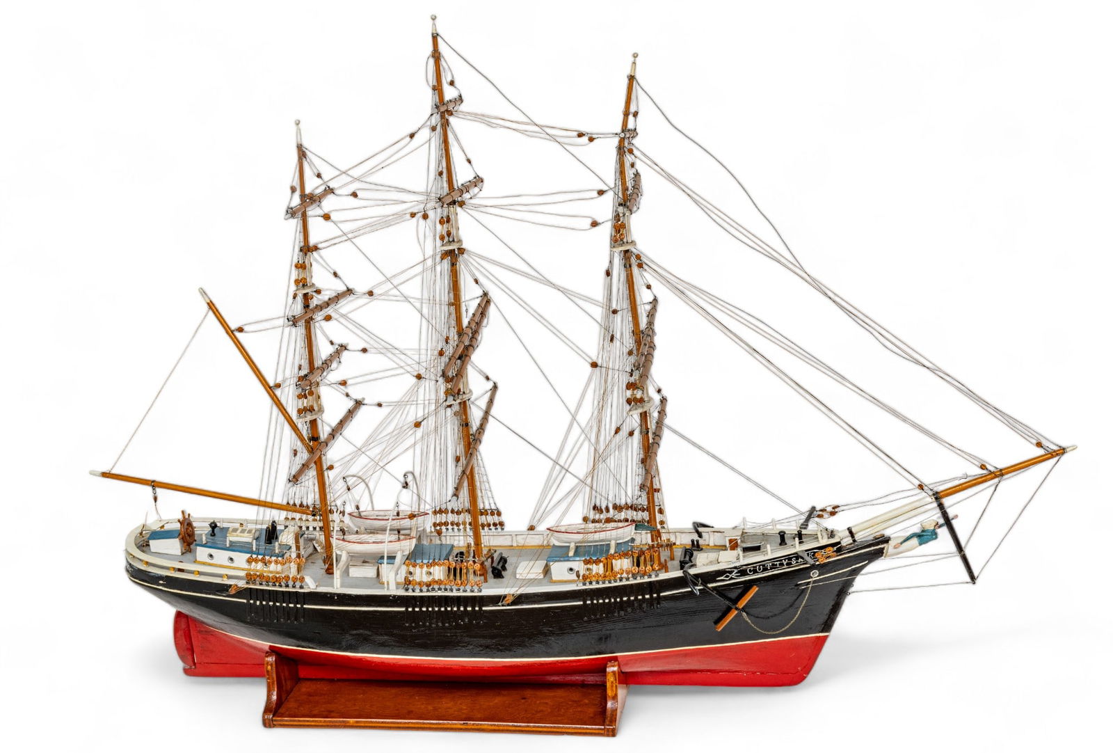 Wooden Ship Model of the British Clipper 'Cutty Sark', Second Half 20th C., H 33.25" W 8.25" L 49": Wooden Ship Model of the British Clipper 'Cutty Sark', Second Half 20th C., H 33.25" W 8.25" L 49" | Hand constructed and painted. Model of the British clipper ship 'Cutty Sark', one of the last tea t