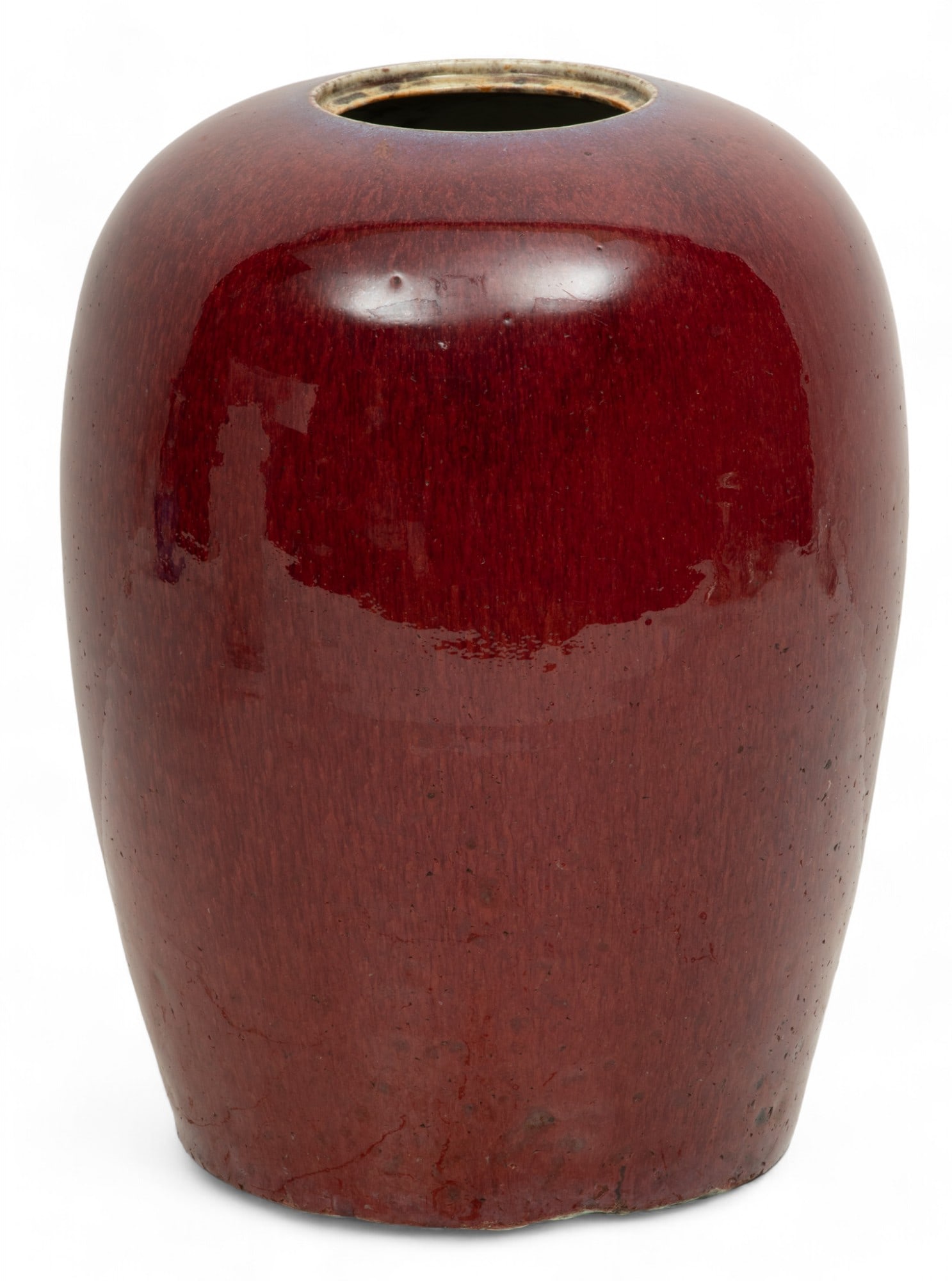 Chinese Sang De Boeuf Glaze Porcelain Ginger Jar, H 11" Dia. 8": Chinese Sang De Boeuf Glaze Porcelain Ginger Jar, H 11" Dia. 8" | Ox blood red glaze ginger jar. No markings on the underside. Overall height including the wood base: 12.5". Provenance: Property from 