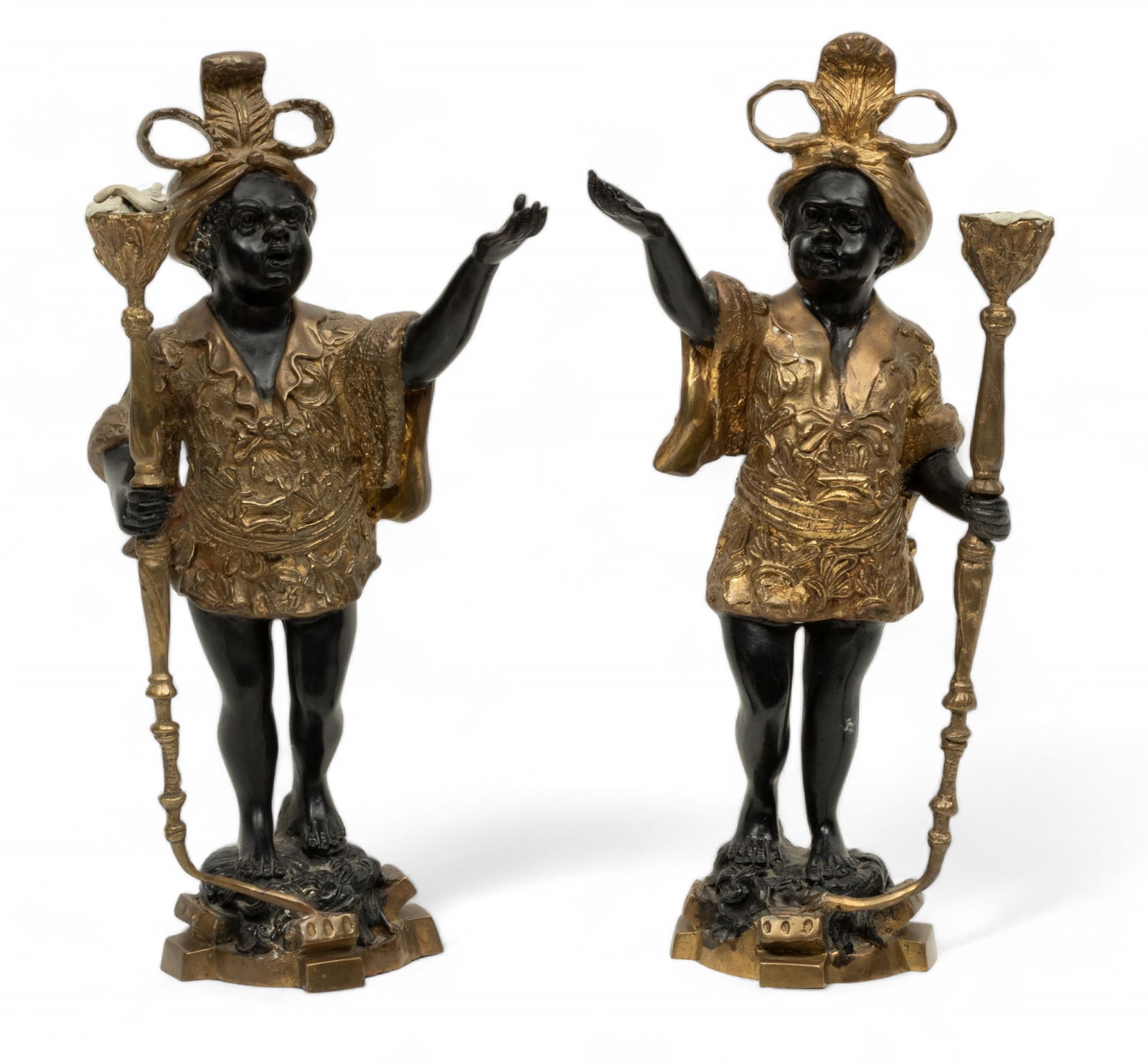 Pair of Blackamoor Painted Bronze Candlesticks, Ca. 19th C., H 15.5" W 7" Depth 4": Pair of Blackamoor Painted Bronze Candlesticks, Ca. 19th C., H 15.5" W 7" Depth 4" | Each donned in Venetian clothing with a single candlestick torchiere and raised palm. Unsigned. Provenance: Propert