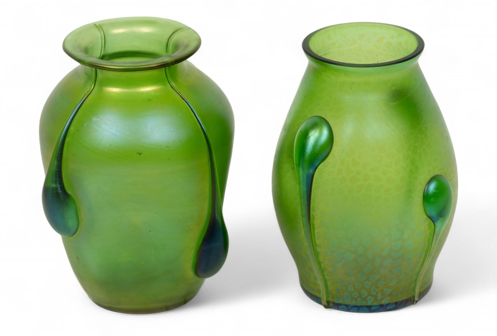 Loetz (Austrian) Vesuvian Green Glass Ground with Crete Tadpoles Vases, 1901, H 5.5" Dia. 3.75" 2: Loetz (Austrian) Vesuvian Green Glass Ground with Crete Tadpoles Vases, 1901, H 5.5" Dia. 3.75" 2 pcs | the vases having a crete glatt ground with crete silberiris lobed tadpoles. Unsigned. Provenance