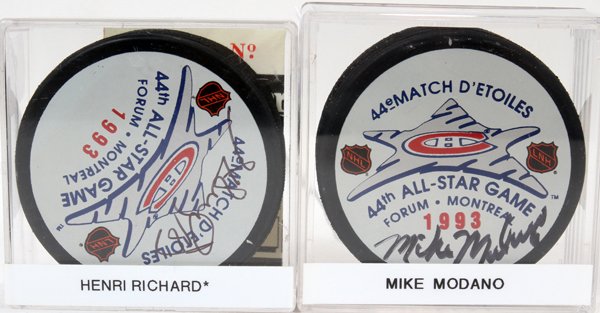 NHL AUTOGRAPHED 1993 ALL-STAR GAME PUCKS, 2: NHL AUTOGRAPHED 1993 ALL-STAR GAME PUCKS, MIKE MODANO AND HENRI RICHARD, 2 PCS.:1993 National Hockey League All-Star Game pucks signed in black Sharpie by Dallas Stars player Mike Modano and Montreal 