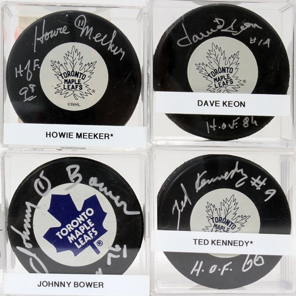 TORONTO MAPLE LEAF AUTOGRAPHED HOCKEY PUCKS,: TORONTO MAPLE LEAF H.O.F. AUTOGRAPHED HOCKEY PUCKS, 4 PCS.:pucks autographed in silver Sharpie by Toronto Maple Leaf Hall Of Fame players Johnny Bower, Dave Keon, Ted Kennedy and Howie Meeker; Stored 
