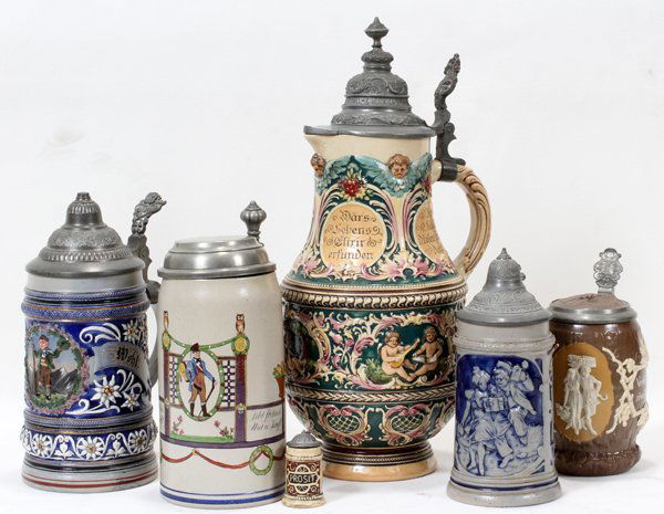 GERMAN EARTHENWARE STEINS, SIX, H 2 1/2" - 15": GERMAN EARTHENWARE STEINS, SIX, H 2 1/2" - 15":Various shapes and sizes. Two of the six are salt glazed.
